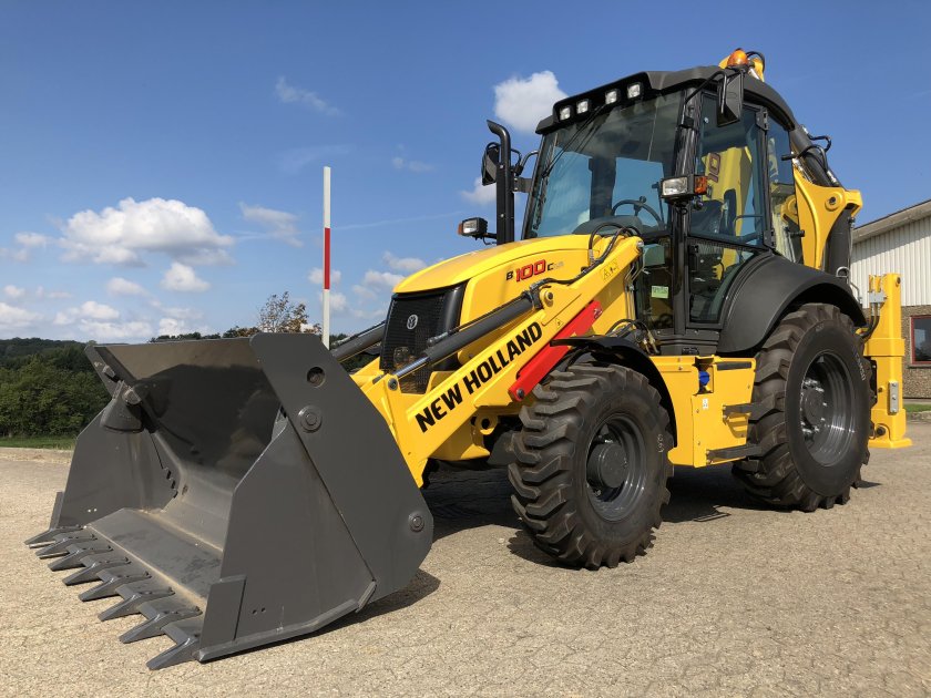 Экскаватор погрузчик Нью Холланд 100