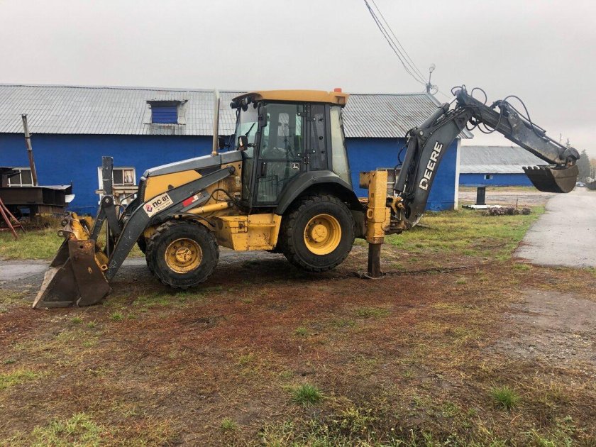 Экскаватор погрузчик 710 джон дир