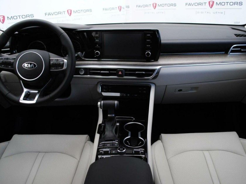 Серая киа к 5