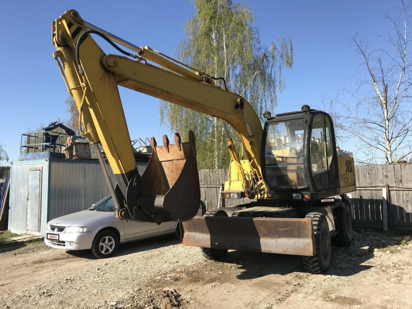 Колесный экскаватор ТВЭКС