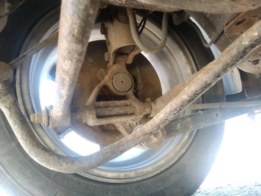 Замена поперечных рычагов задней подвески Мазда Премаси