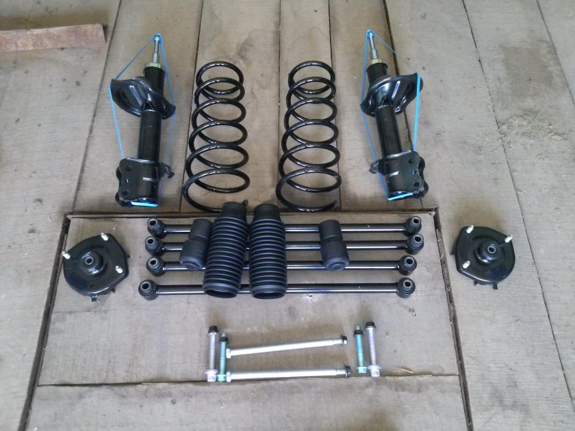 Задняя подвеска Мазда фамилия bj5