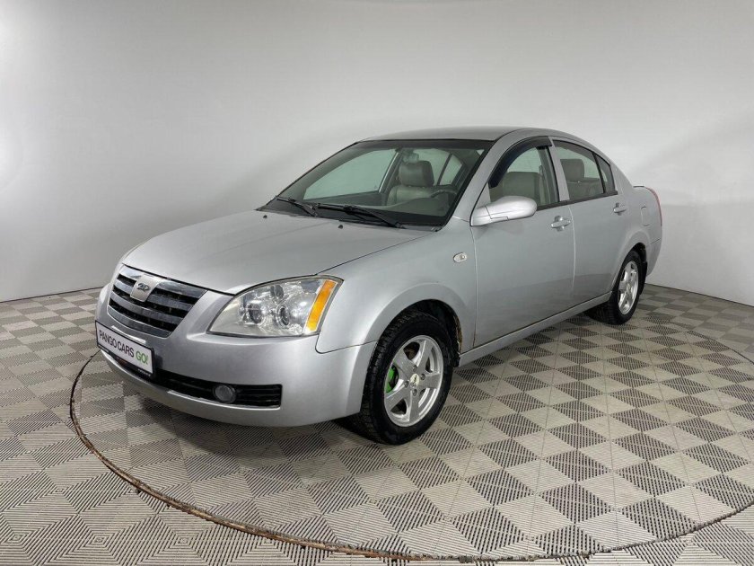 Чери машина серая