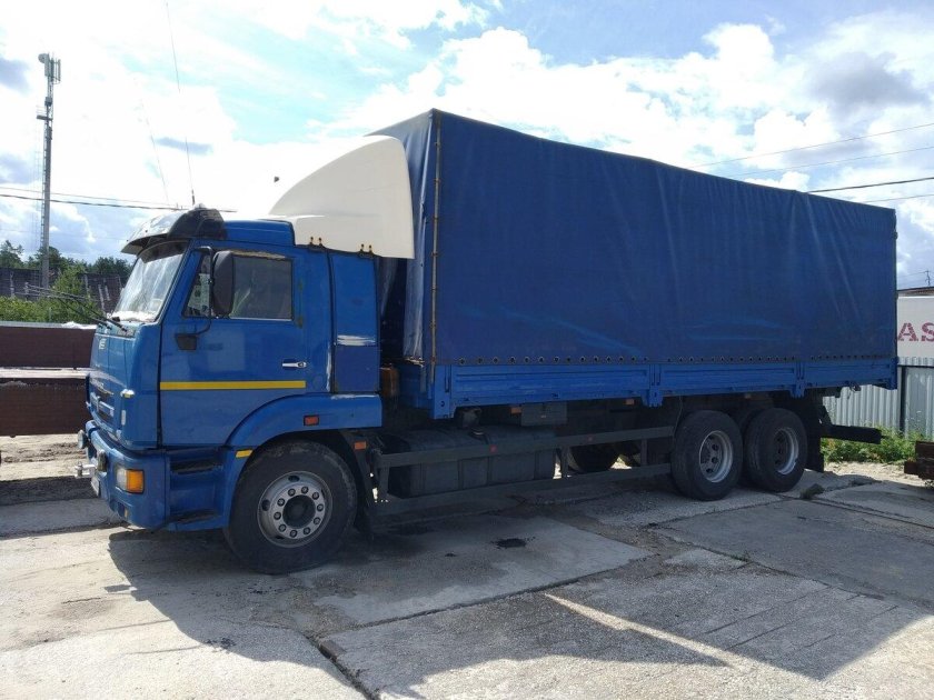 КАМАЗ бортовой тентованный 65117