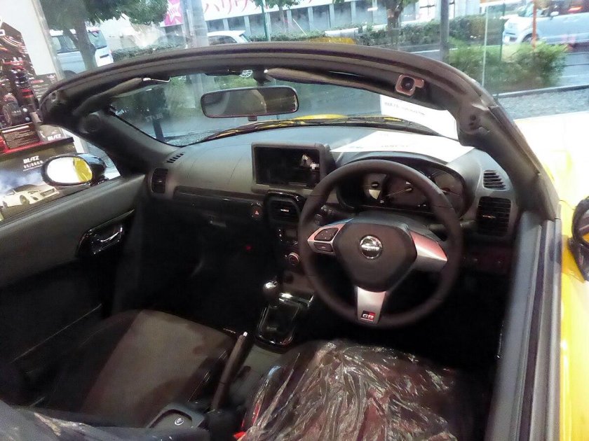 Дайхатсу купен рыжий салон