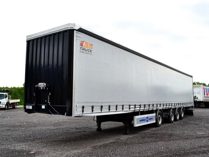 Полуприцеп бортовой Meusburger Новтрак