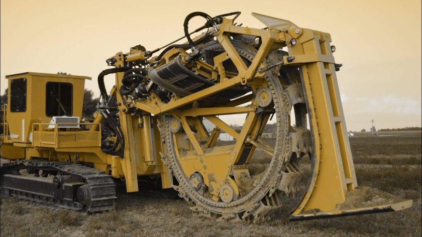 Роторный траншейный экскаватор