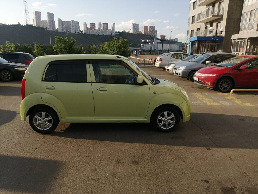 Ниссан Пино 2009