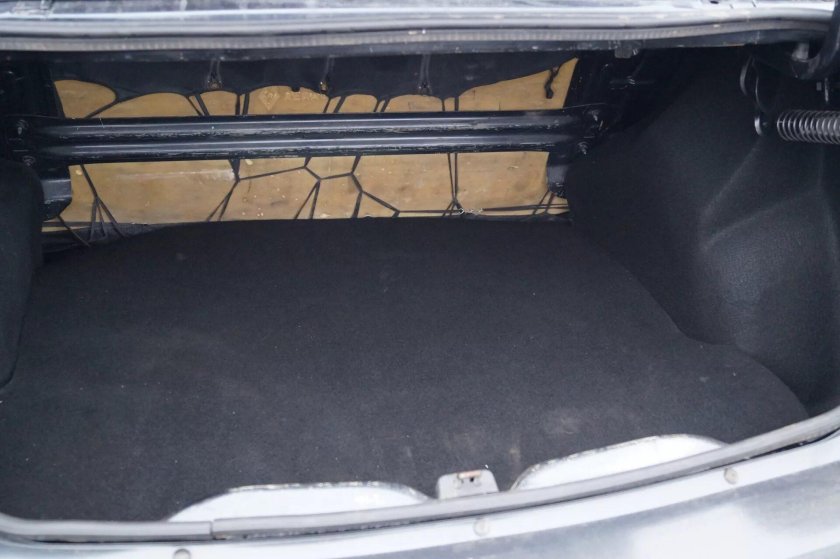 Логан 1,4 обшивка багажника