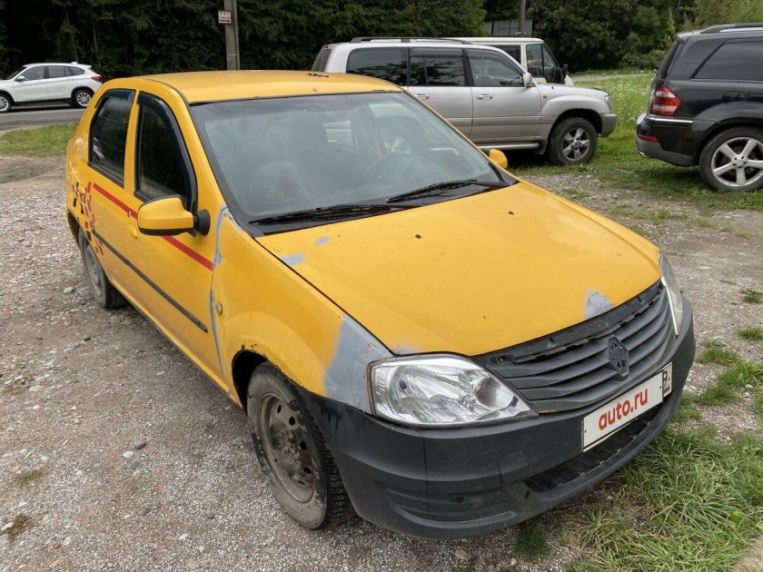 Рено Логан 1 желтый