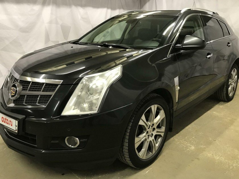 Cadillac SRX II 3.0 v6 4wd at (271 л.с.) черный с пробегом на снегу