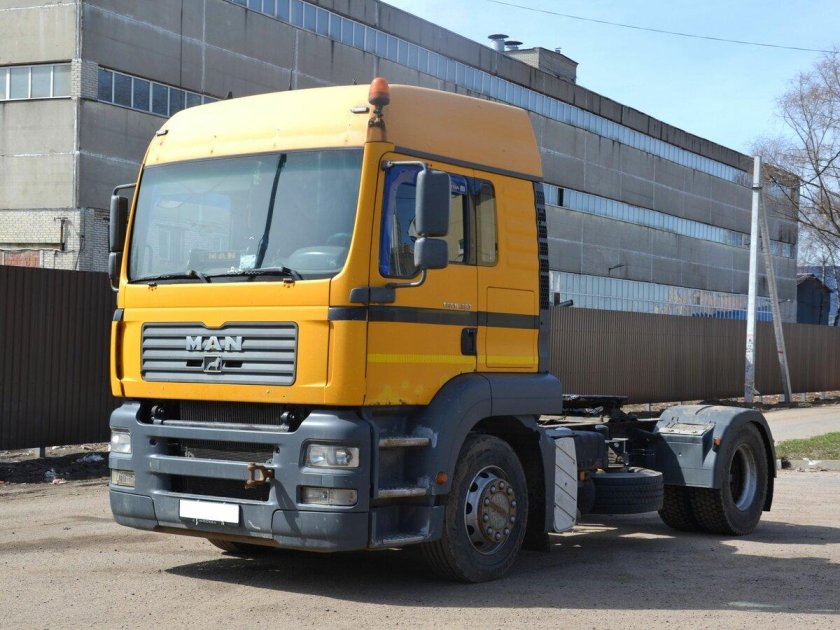 Ман ТГА 2004 желтый