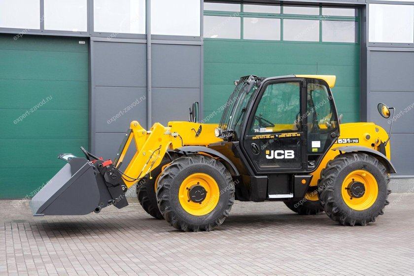 Фронтальный погрузчик с откидывающимся ковшом