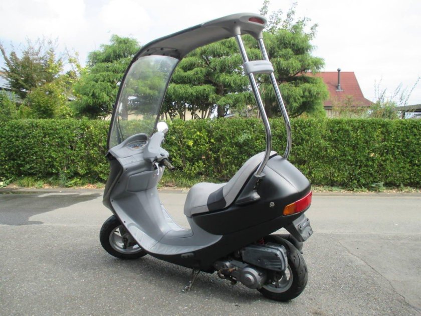 Скутер Honda cabina