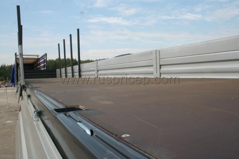 Шторно-бортовой полуприцеп с кониками Грюнвальд