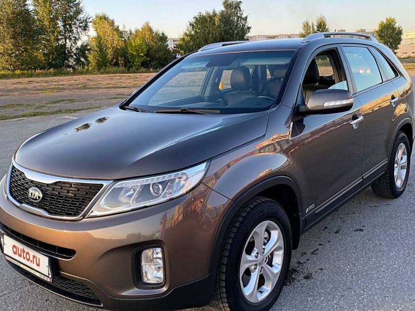 Киа Соренто 2013 коричневый