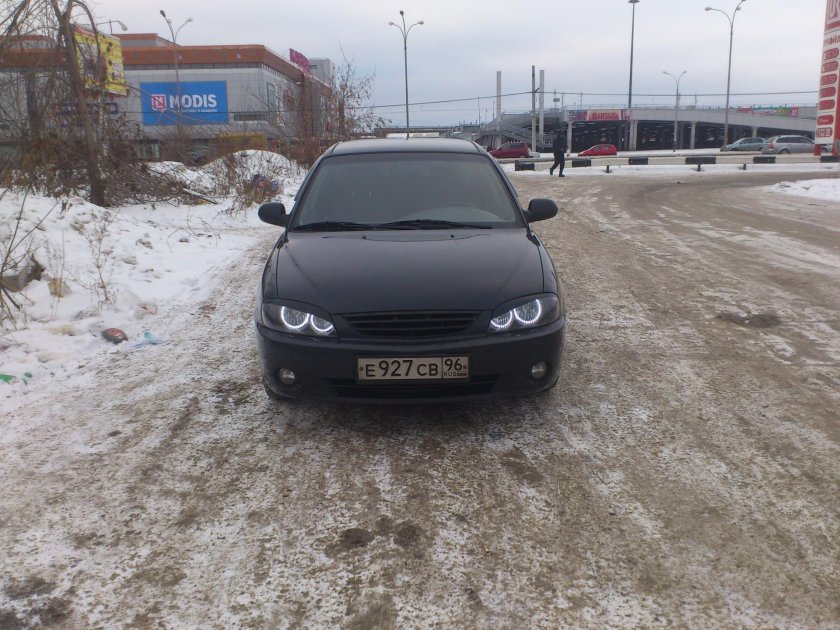 Киа спектра черная тонированная