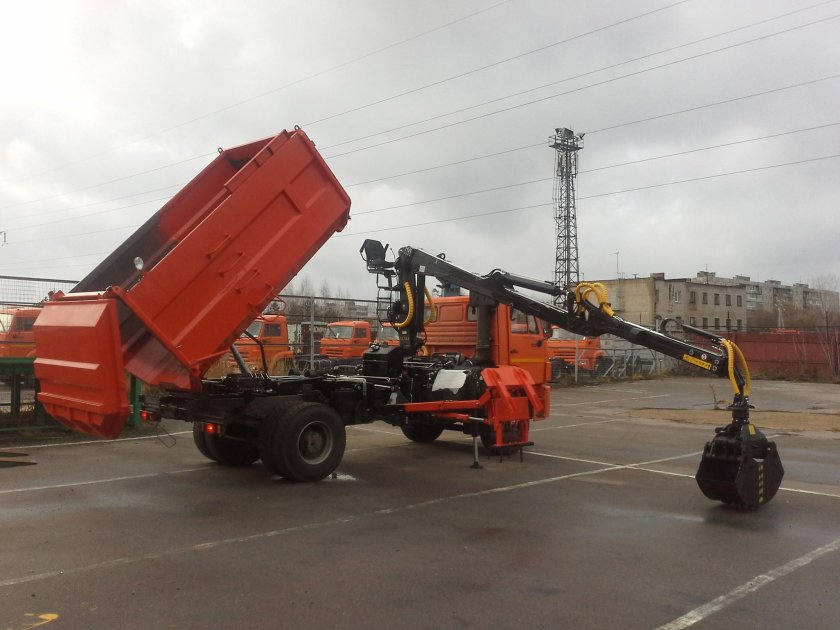 Мусоровоз КАМАЗ С КМУ