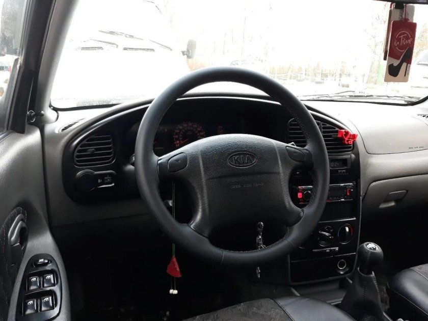 Обтяжка салона Киа спектра