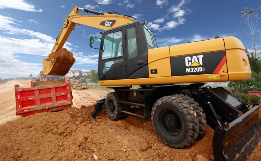 Катерпиллер 320 колесный экскаватор
