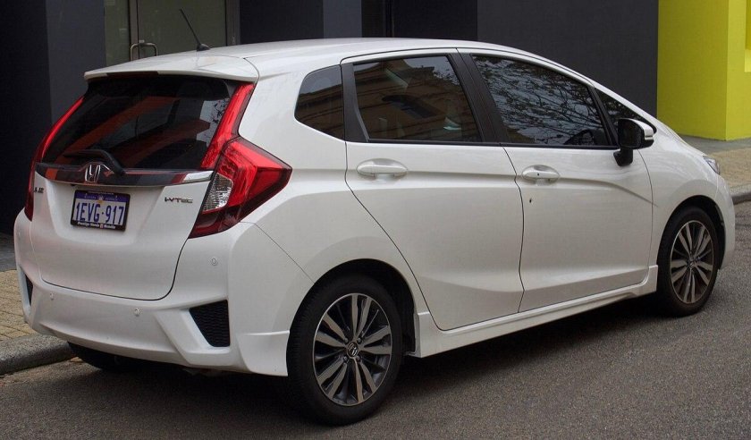 White Honda Jazz 2015 Side view HD foto