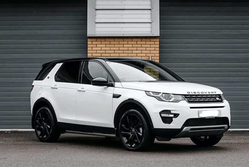 Белый ленд Ровер Дискавери спорт