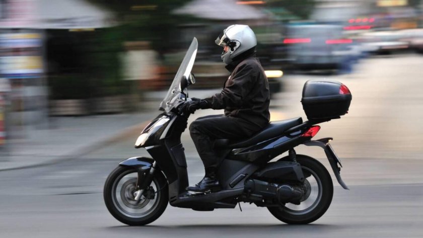 Водитель скутера