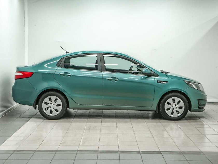 Киа Рио 3 светло зеленая