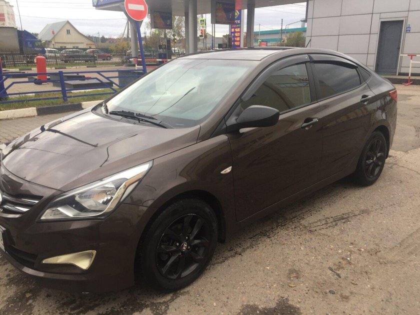 Хëндай Солярис коричневый 1.4