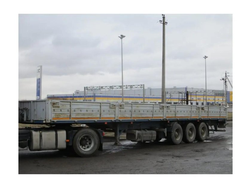 Полуприцеп бортовой МАЗ 975800