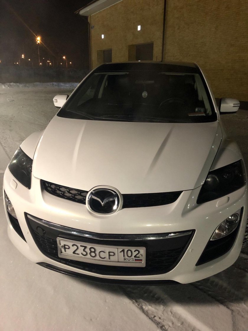 Черные фары Mazda