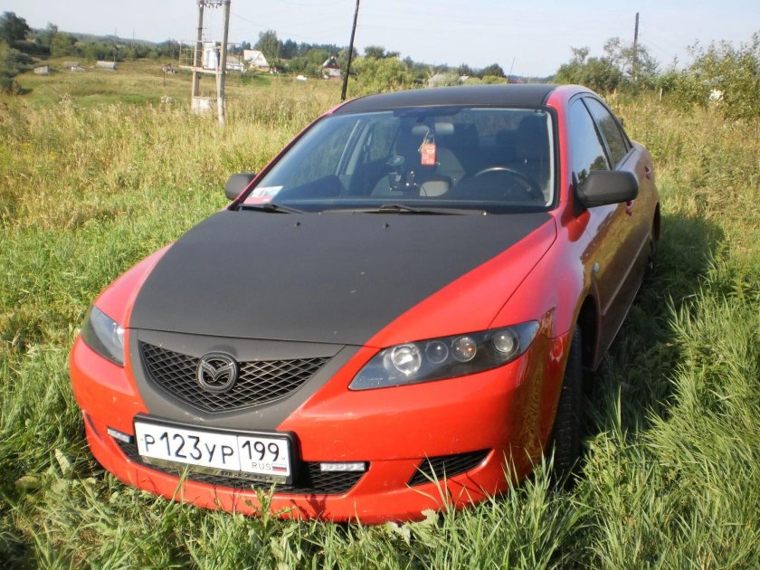 Мазда 3 2005 оранжевая