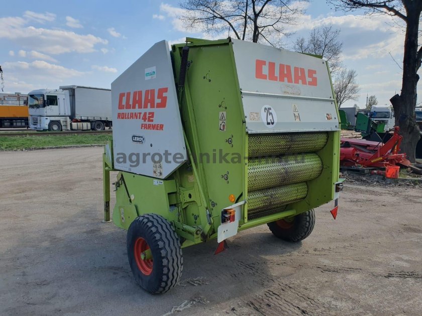 Робот для снятия обвязки рулонов