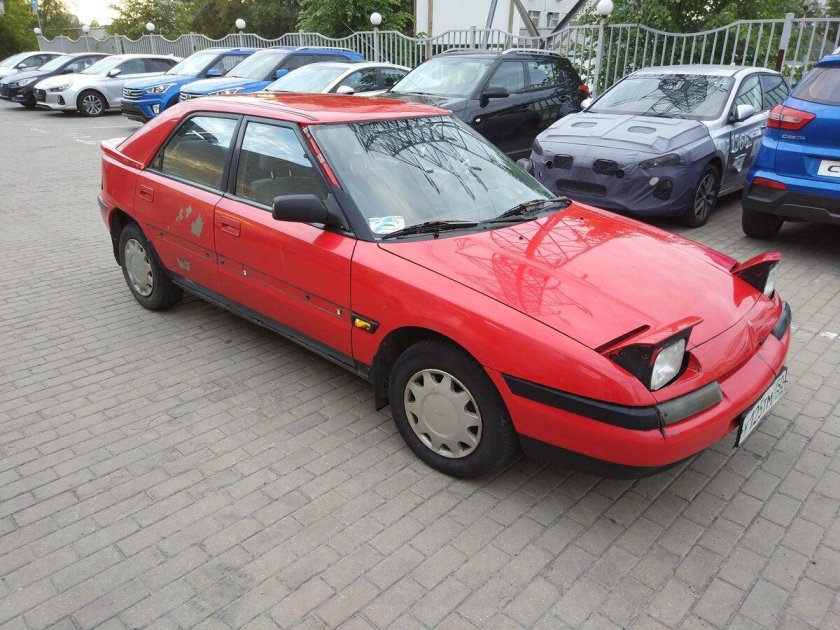 Mazda 323 IV (bg)