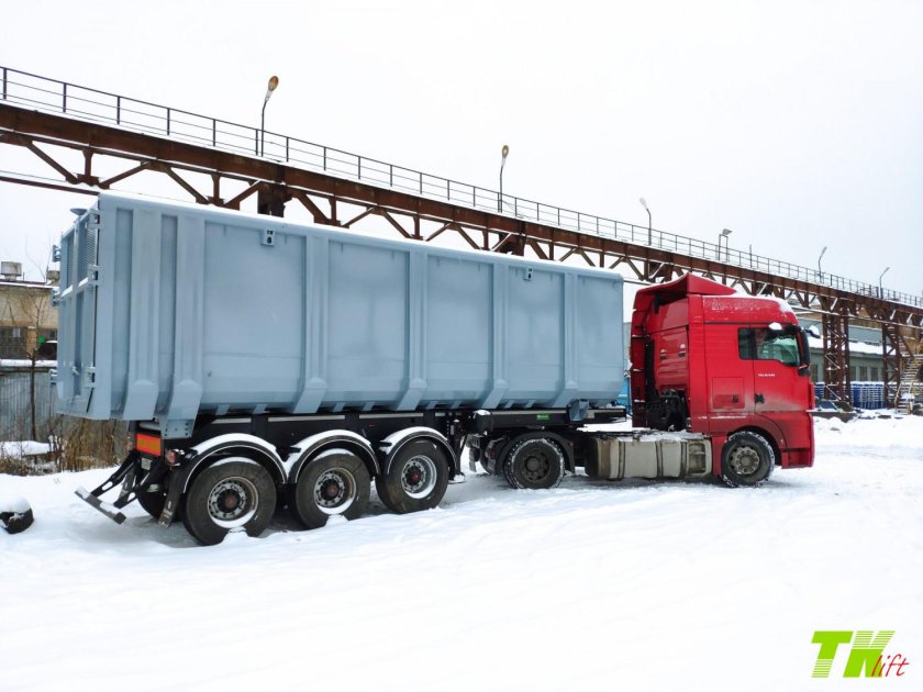 Ломовозный полуприцеп с КМУ