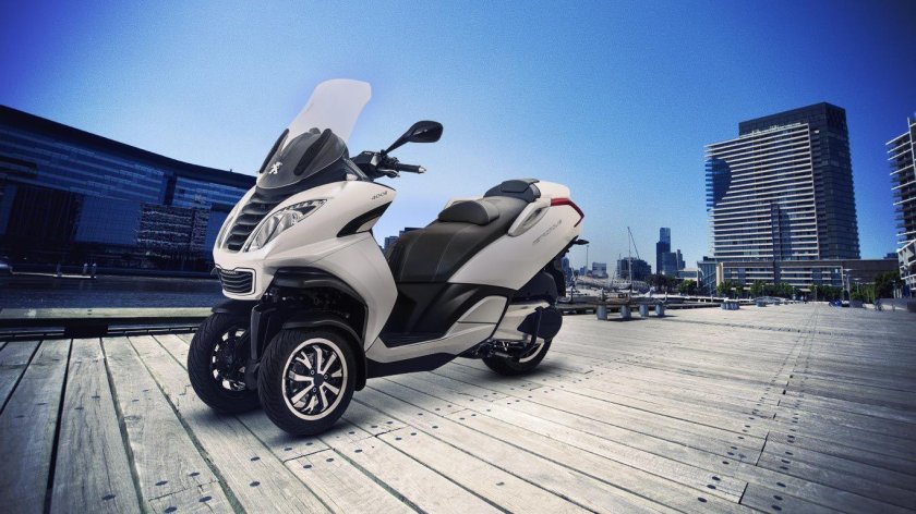 Трехколесный скутер пиаджио