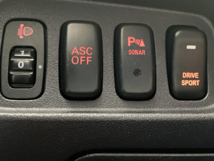 Кнопка ESP off на Митсубиси Аутлендер