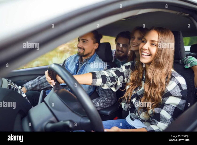 Boy and girlfriend travelling in car