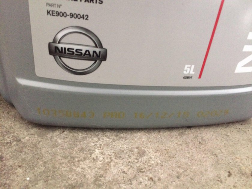 Где на зеркале увидеть оригинал или нет Nissan Tiida