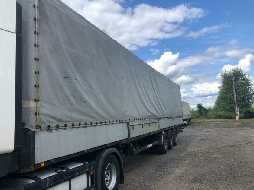 Бортовой полуприцеп Шварцмюллер