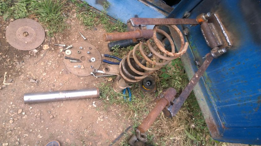 Станок для разбора стоек авто