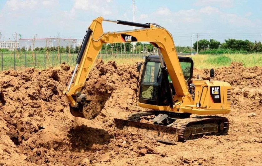 Катерпиллер экскаватор